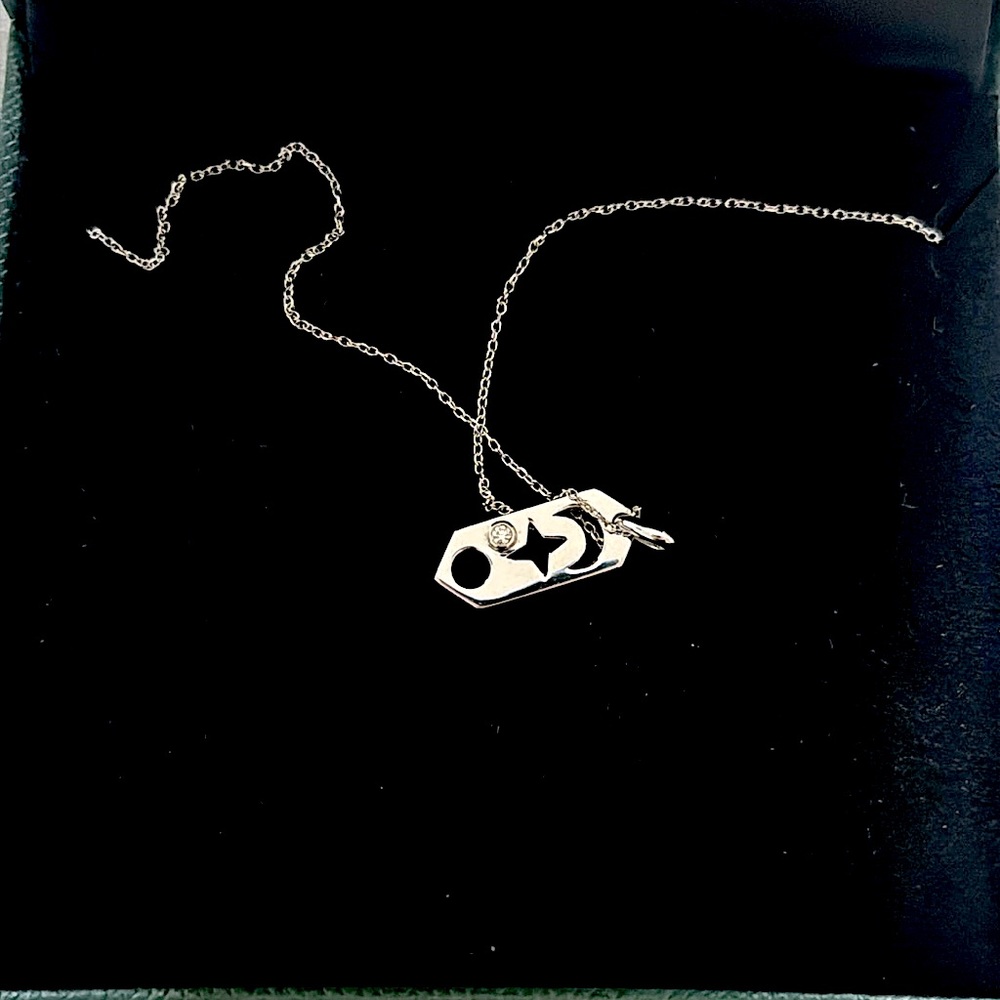 Beautiful silver necklace with moon and diamond from Spence diamonds
